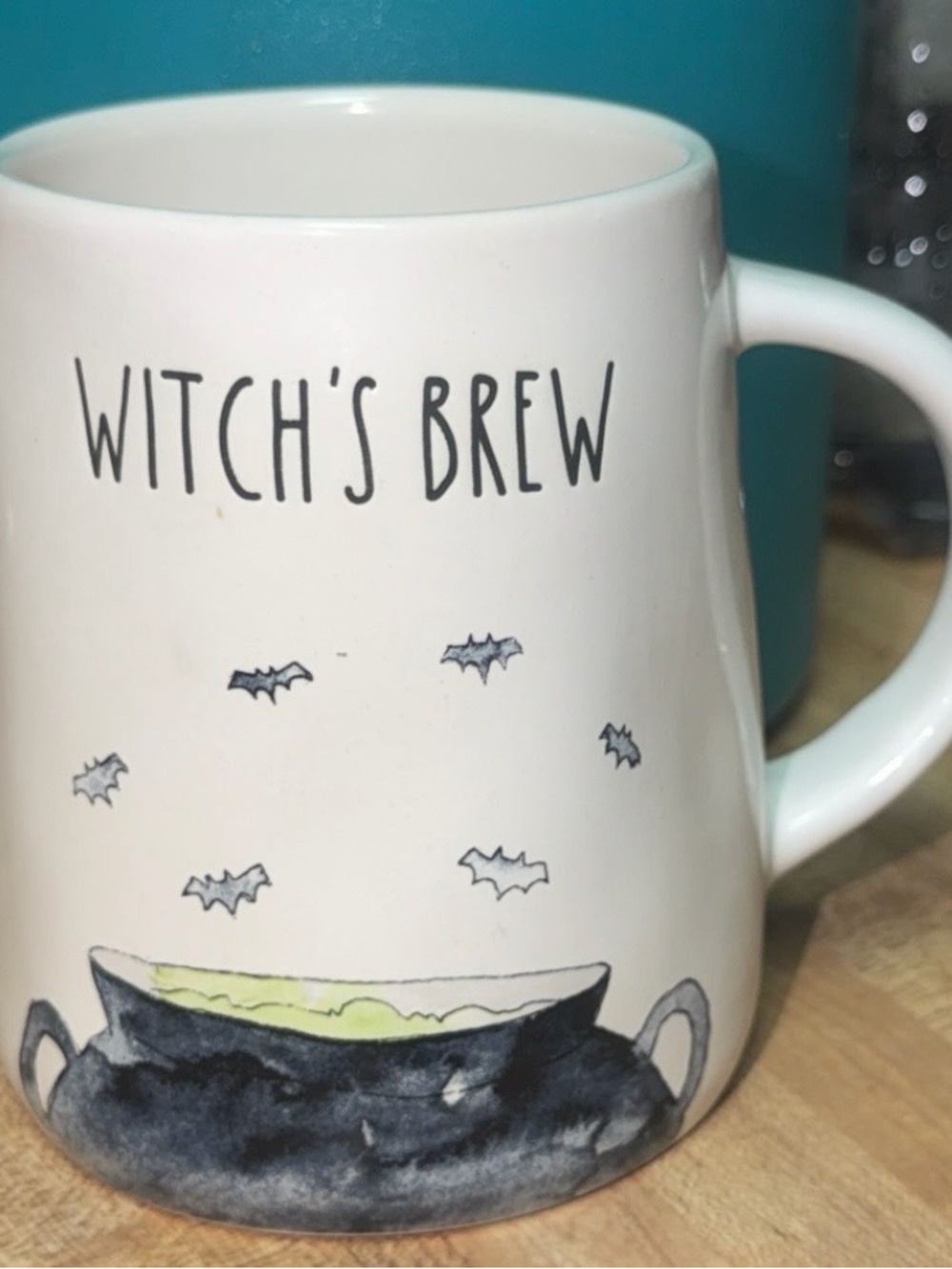 Rae Dunn Mug with 'Witch's Brew' text